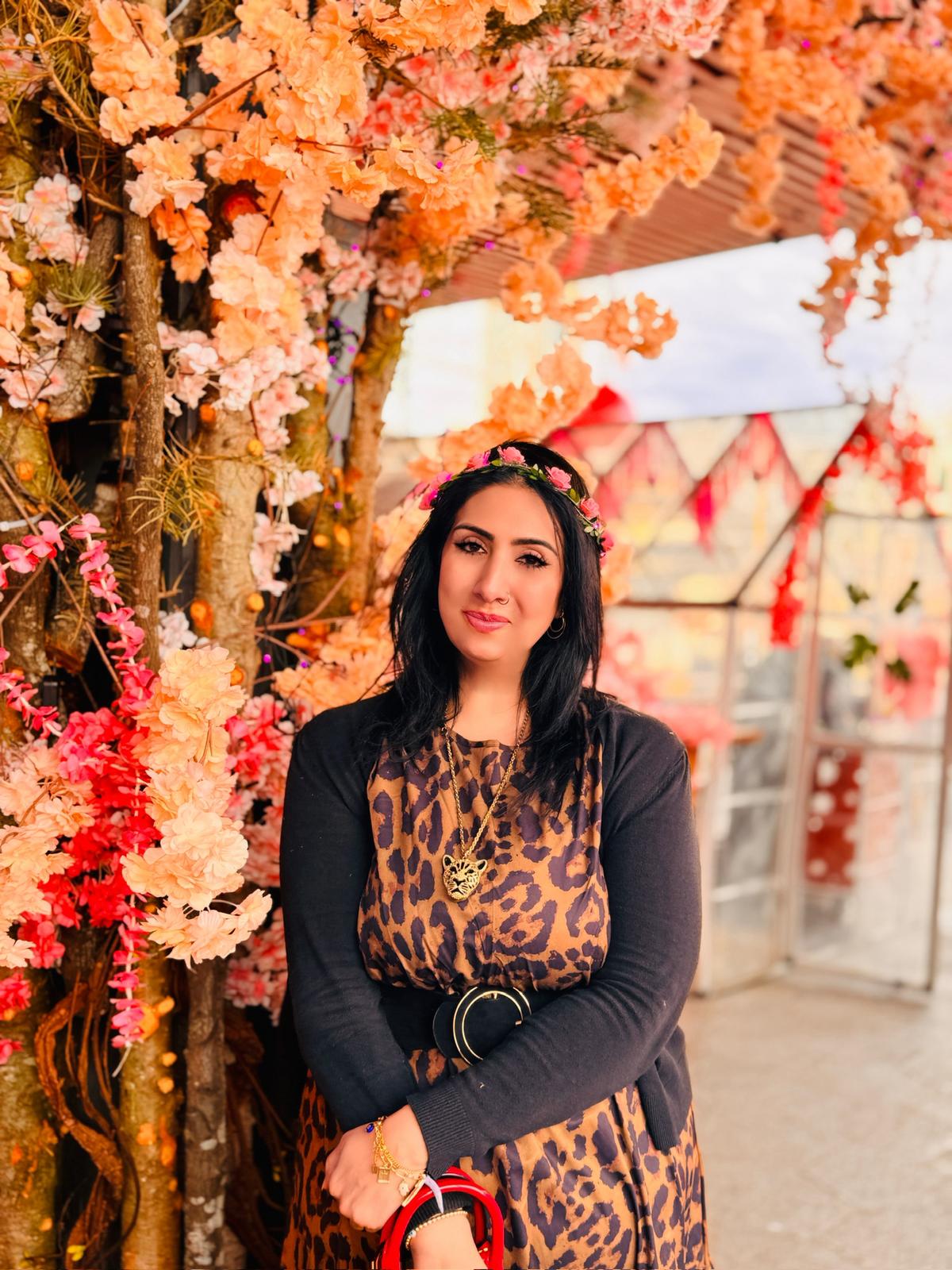 Rubina smiling with a flower crown